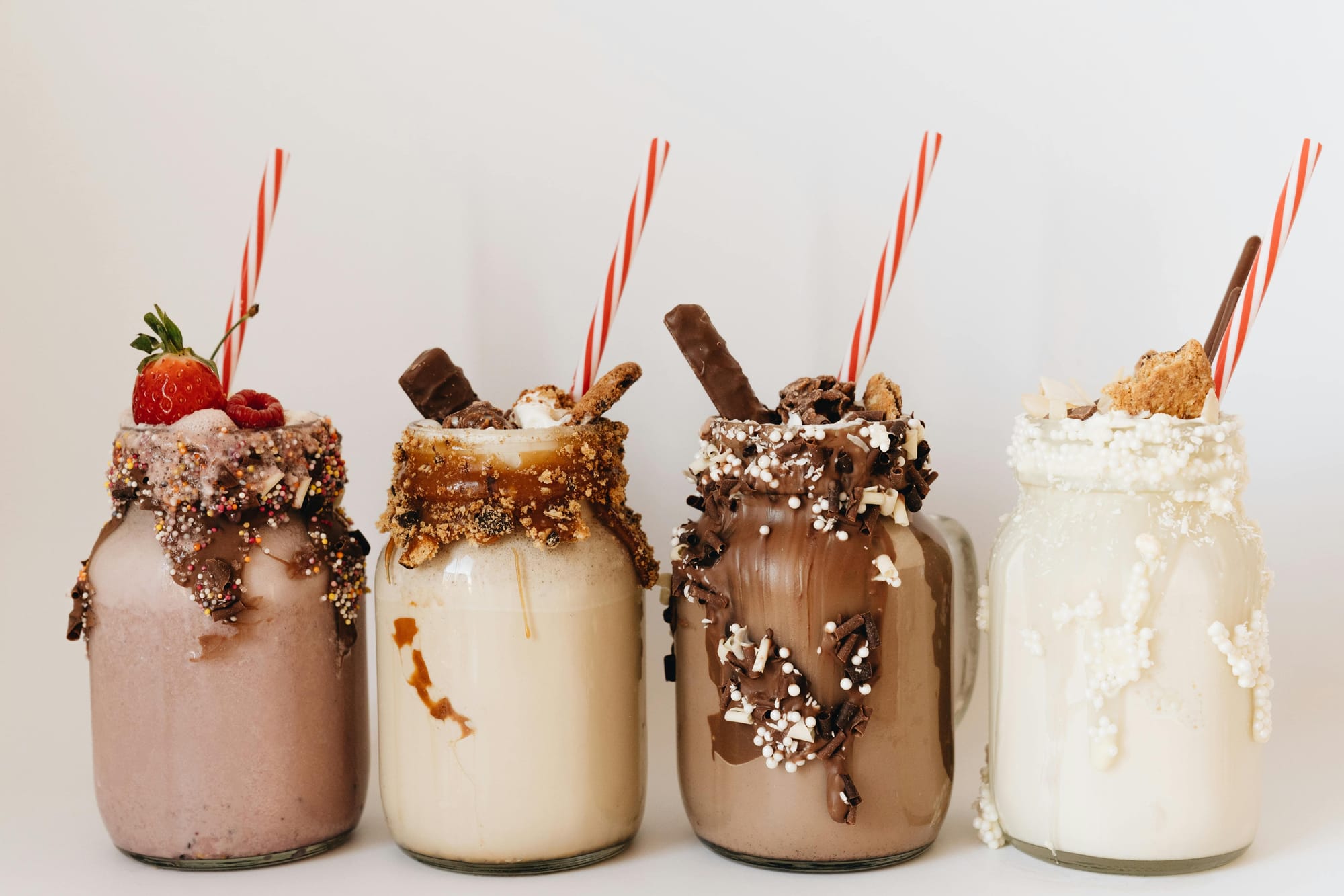 Close-Up Shot of Milkshakes · Free Stock Photo