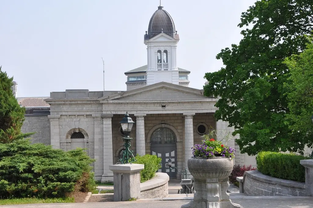 A building with a fountain in front of it. Kingston penitentiary prison kingston. - PICRYL - Public Domain Media Search Engine Public Domain Image